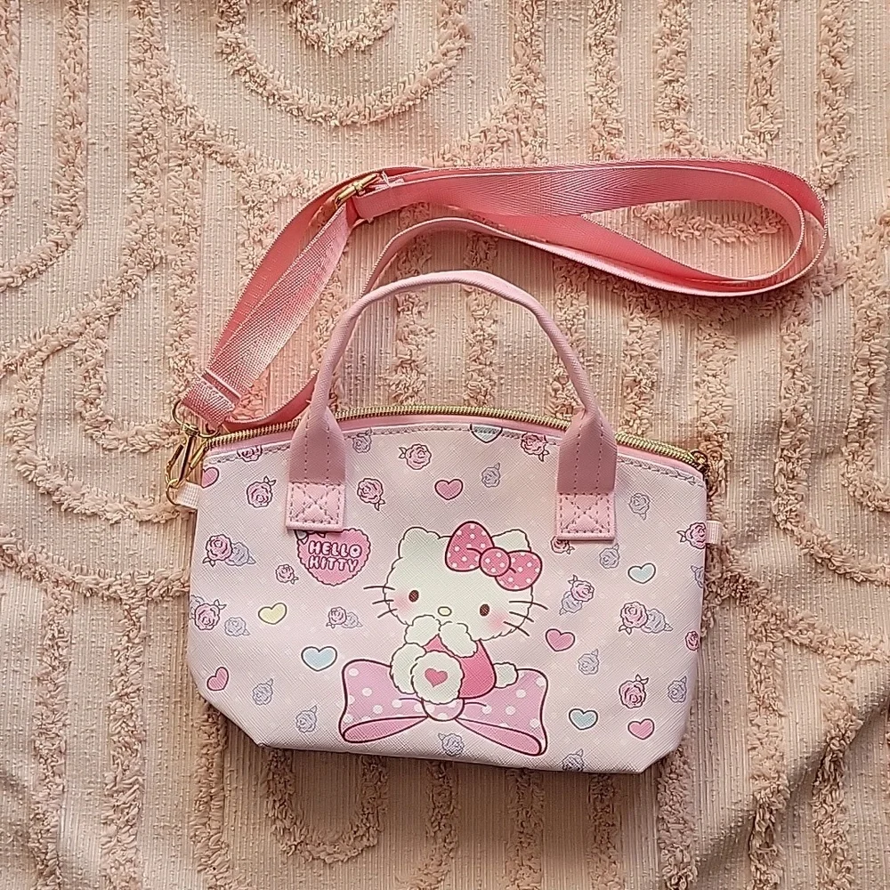 Hello Kitty Handbag with adjustable shoulder strap, pink 💗.  NWOT.